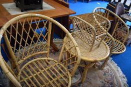 A selection of canework conservatory furniture