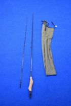 A SAGE GRAPHITE III GFL 6113 RPLB ROD - 11 FT 3' IN AN UNMARKED SLEEVE