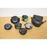 5 fly fishing reels by GEO lOGIC, Daiwa 230, Ron Thompson in original case, a Martin 65 and a