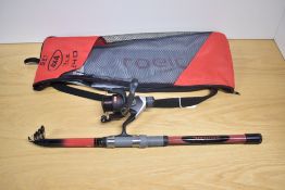 A geologic telescopic fishing rod and reel in marked carry case