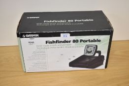 A boxed Garmin fishfinder 80 Portable