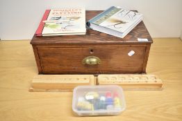 A Beginners fly Tying set including vice, feathers books, dvd, stands in a nice old single draw box