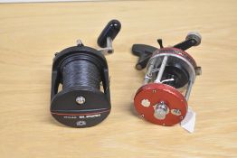Two sea fishing reels. A Sealine SL250H and an ABU high speed multiplier