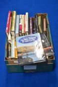A box of fishing and fly tying related books