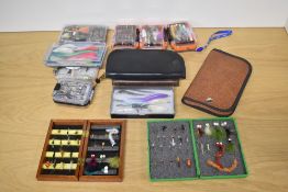 A large selection of salmon and sea trout flies and Lures in 13 pocket boxes and wallets