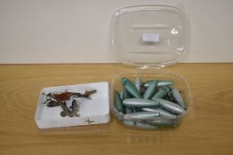 A selection of vintage fishing minnows and some hand painted wooden lure bodies