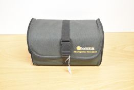 A Cobra multiplier fly reel in soft case with 3 spare spools