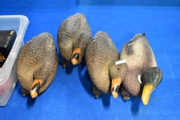 Four Mallard decoy ducks