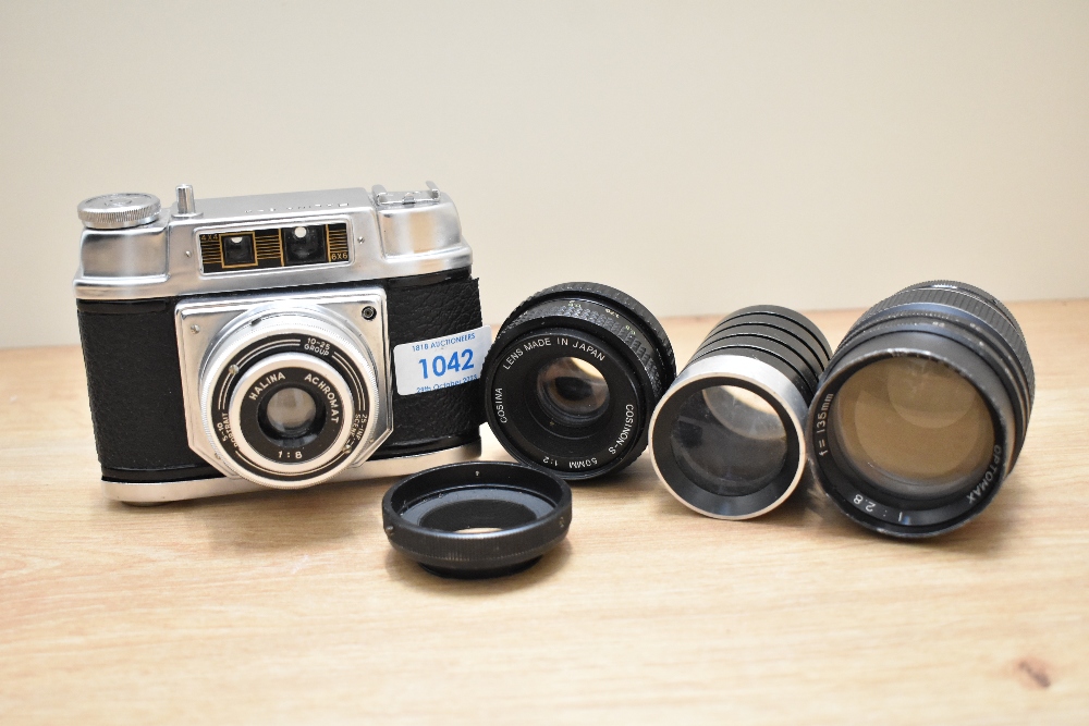 A Halina 6-4 camera with a Halena 1:8 lens along with a Cosina Cosinon-S 50mm 1:2 lens, a Optomax