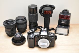 A Nikon F801AF camera body No2438796 with EL-Nokkor 1:2,8 50mm lens, a Sigma UC Zoom-K 1:4-5,6 70-