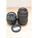 A Carl Zeiss Jena Tessor 2,8 50mm lens and a Carl Zeiss jena MC S 1:3,5 135mm lens