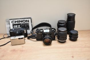A Chinon CE-4 camera with Chinon 1:1,4 50mm lens, a Cosinon-W 1:2,8 28mm lens, a Pentax - A zoom 1: