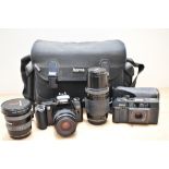 A Canon EOS500 camera with Canon Ef35-80mm 1:4,5-5,6 lens, a Ricoh TF900 Automatic camera, a Vivitar