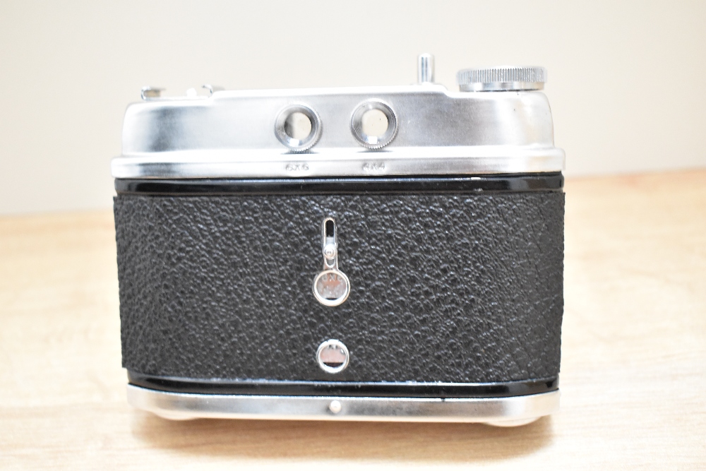 A Halina 6-4 camera with a Halena 1:8 lens along with a Cosina Cosinon-S 50mm 1:2 lens, a Optomax - Image 3 of 4