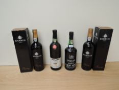 Four bottles of Port, Baros Tawny Port x2 in card boxes, Taylor's White Port and Pocas LBV 1980 Port