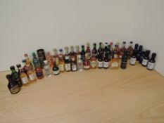 A collection of 48 Miniatures including 16 Malt and Blended Whisky, Bowmore seen