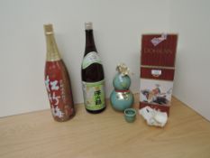 Two Bottles and a flagon of Sake, Sawanotsuru De Luxe 14.5% vol, 1.8 lit, Sho Chiku Bai, 1.8 li,
