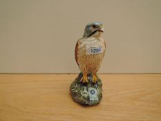 A Royal Doulton ceramic Kestrel Flagon 1979 containing Whyte & Mckay Blended Whisky