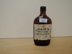 A flat bottle of Haig's Gold Label Blended Scotch Whisky, 70% proof, no capacity stated, spring