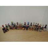 A box containing 30 miniature bottles of Sandemans Ruby Port, Johnnie Walker Red Label 70 proof,