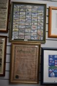 A framed collection of aircraft related cigarette cards and a Rolls Royce guarantee.