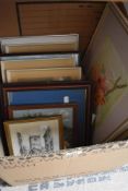 A carton of assorted pictures, prints and frames.