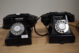 Two vintage bakelite telephones in black