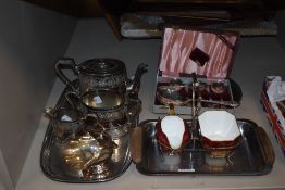 A selection of plated ware, including a Wedgewood condiment set and a boxed set of spoons.