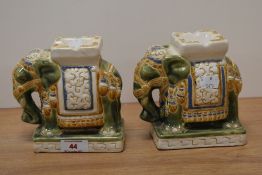 A pair of ceramic Indian elephant tbale ashtrays.