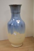 A mid-20th Century West German vase, with blue drip glaze, and incised marks to the base,