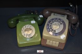 Two vintage mid century rotary dial telephones, having been converted.