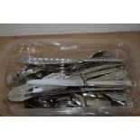 A collection of cutlery, having moulded handles.