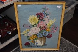 A vintage framed needlework embroidery of a still life