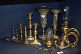 An assortment of brass, including vintage oil lamps, including nursery lamp, candlesticks and silver