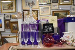 A collection of Edinburgh crystal, Royal Doulton crystal and Royal Scot cranberry glass, with