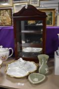 A Trio of Wedgwood Jasper Ware in sage green, a display cabinet of small proportions and a bon bon