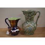 A Maling Art Deco lustre jug, storm pattern, measuring 17cm tall, and a Beswick Ware pitcher, of