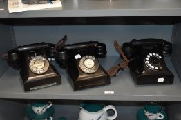 Three vintage mid century rotary dial telephones, having been converted.