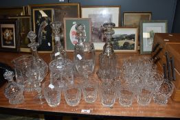 A variety of glass, including Four decanters, cut glass tumblers, biscuit barrel and water jug.