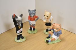A group of four Beswick Pottery limited edition 'Footballing Felines' figures, comprising 'Mee-Ouch'