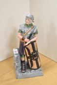 A Royal Doulton bone china historical figure 'The Centurion' HN2726, modelled standing with short