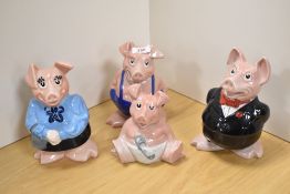 A group of four Wade 'Natwest' piggy money banks, comprising Woody (af), Maxwell, Lady Hilary and