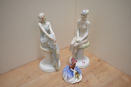 Two Royal Doulton bone china reflections series seated figurines, comprising 'Cocktails' HN3070