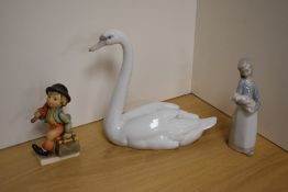 A Lladro porcelain study of a swan, 21.5cm with printed and impressed marks to base, together with a
