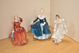 A group of three Royal Doulton bone china figurines, comprising 'Minuet' HN2019, 'Janine' HN2461 and