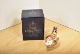 A Royal Crown Derby fine bone china Imari pattern 'Wren' paperweight, with silver coloured stopper