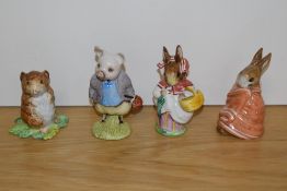 A Group of four Beswick Pottery Beatrix Potter figures, comprising 'Timmy Willie from Johnny Town