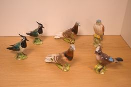 A collection of six Beswick Pottery ornithological studies, comprising two lapwings, number 2416A