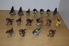 A group of seventeen Beswick Pottery bird studies, comprising four matt Chaffinches 991, three