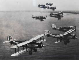 Six photographic prints of fighter planes, including a signed version dated 1949, framed and under